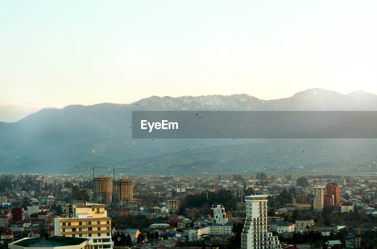 Cityscape against clear sky