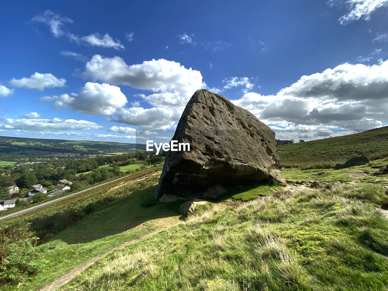 Large boulder, high on the moors, at the, cow and calf rocks, ilkley, uk