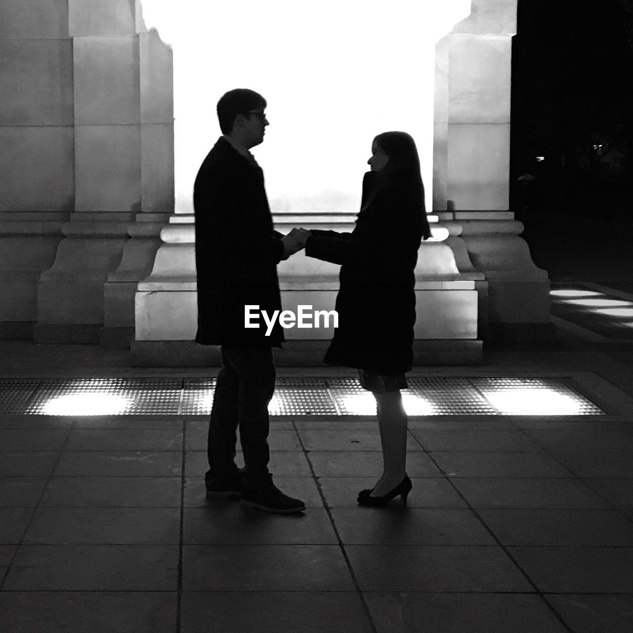 Full length of couple holding hands at washington square park