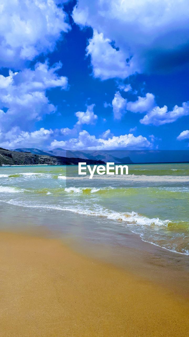 SCENIC VIEW OF SEA AGAINST BLUE SKY