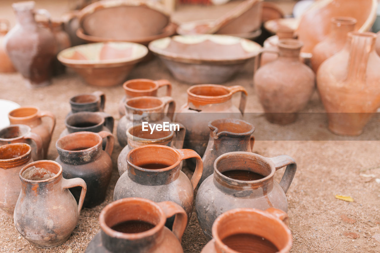 High angle view of earthenware for sale