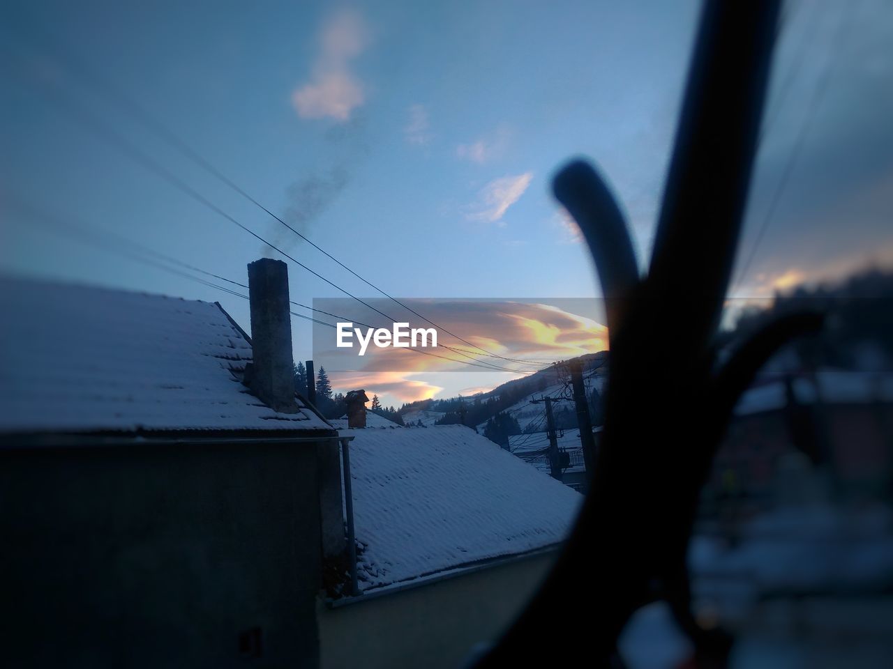 CLOSE-UP OF ELECTRICITY PYLON AGAINST SKY