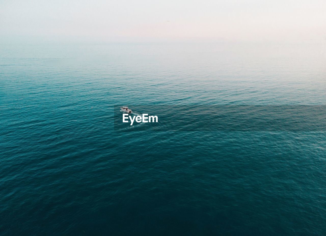 High angle view of ship sailing on sea