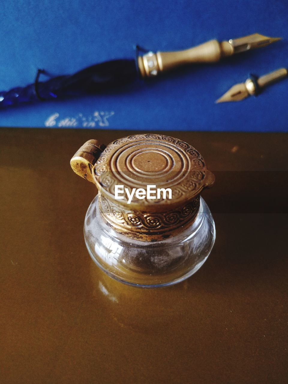 Writing tools for calligraphy in gold and blue 