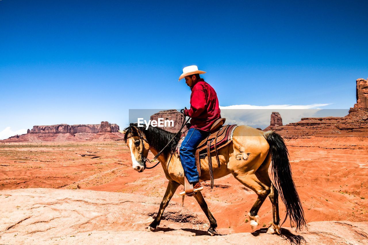 VIEW OF HORSE RIDING