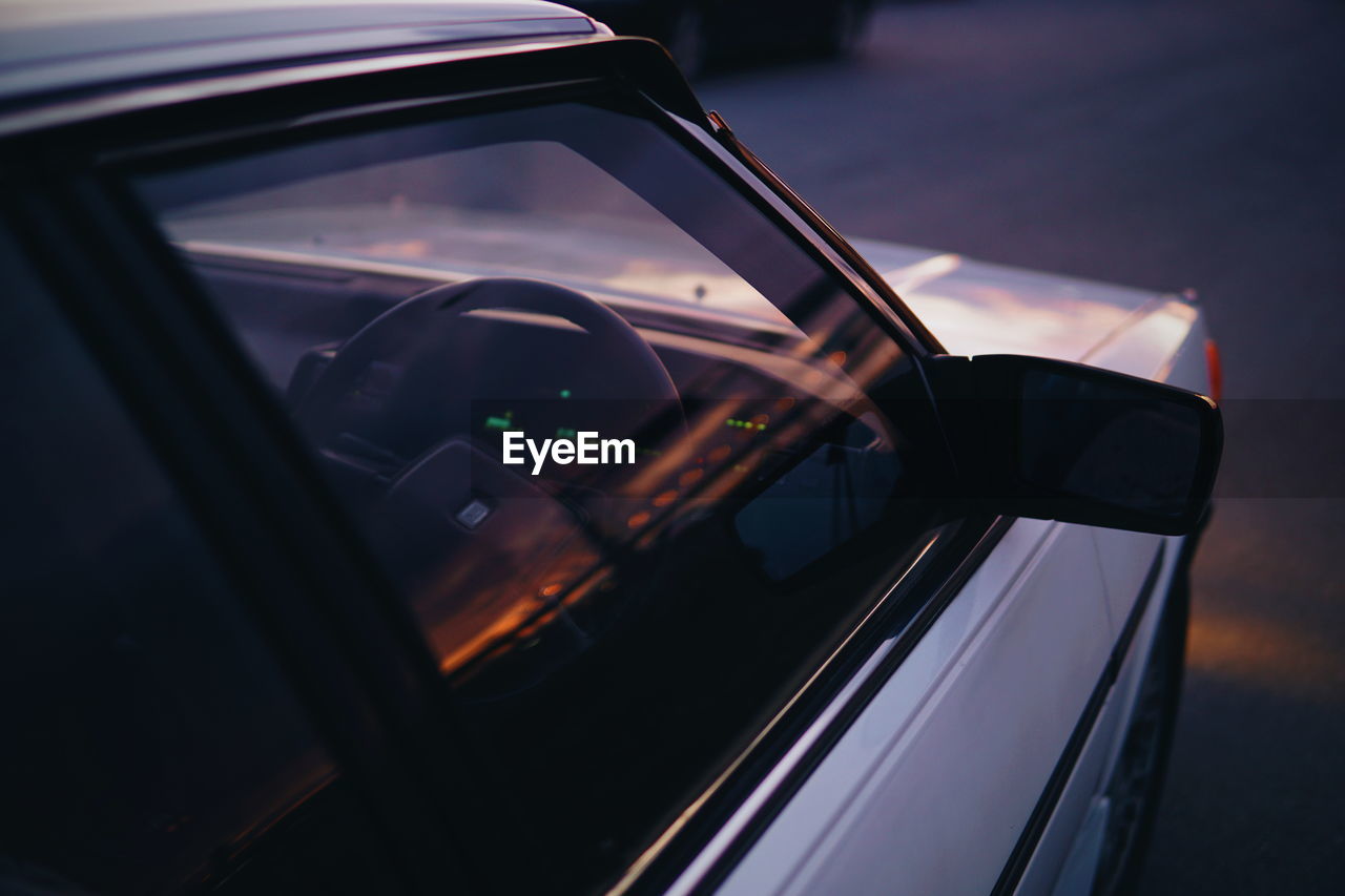 Close-up of car on side-view mirror