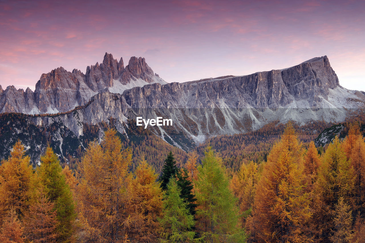 Scenic view of rocky mountains during sunset