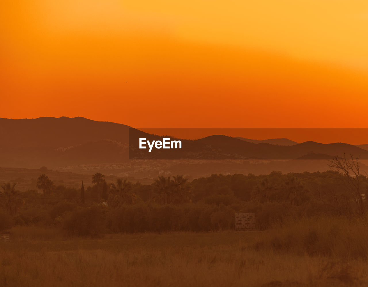 A beautiful orange sunset over montgo vall's area of javea, alicante, spain.