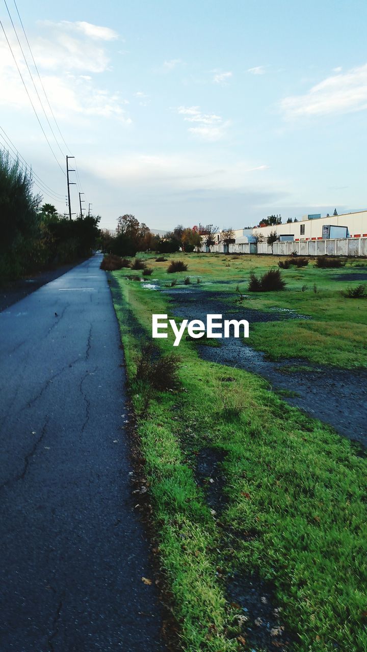 ROAD PASSING THROUGH LANDSCAPE