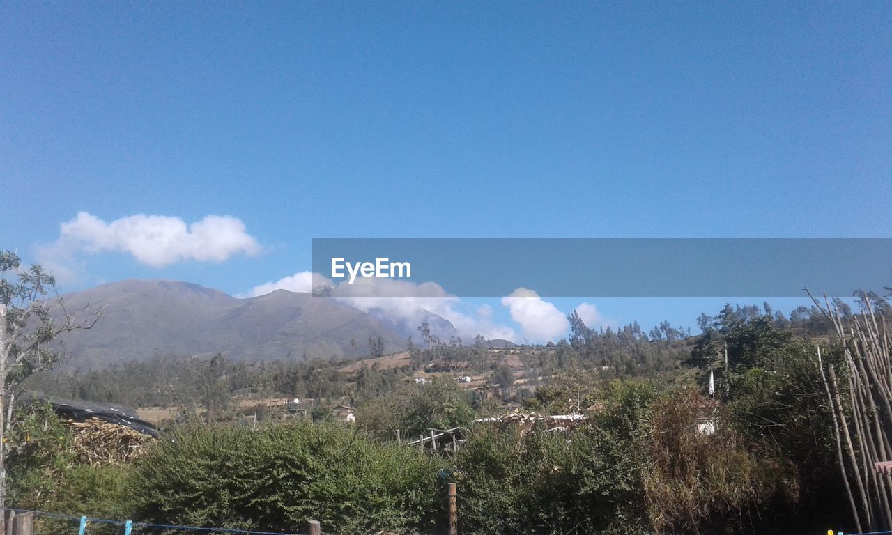 PANORAMIC VIEW OF LANDSCAPE AND MOUNTAINS AGAINST SKY