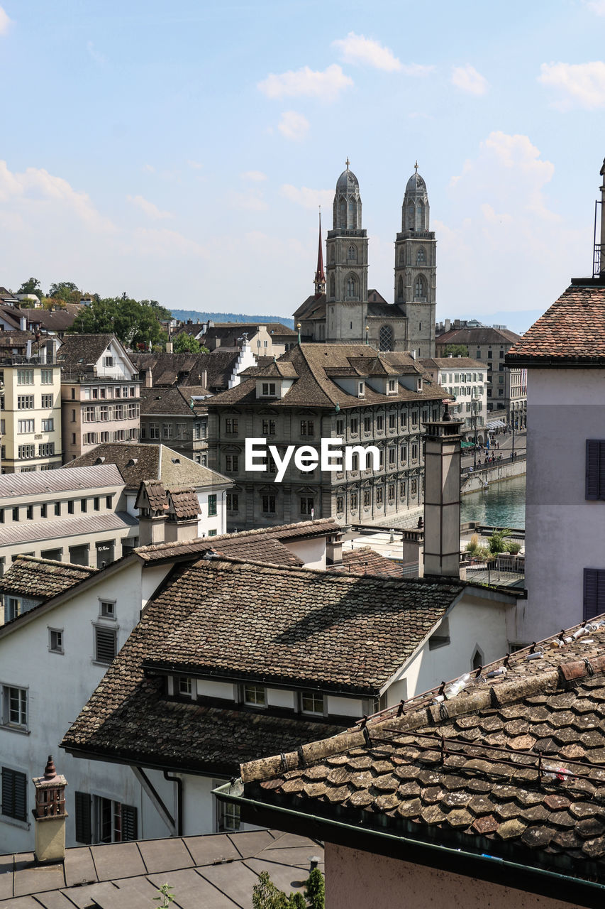 High angle view of buildings in city against sky