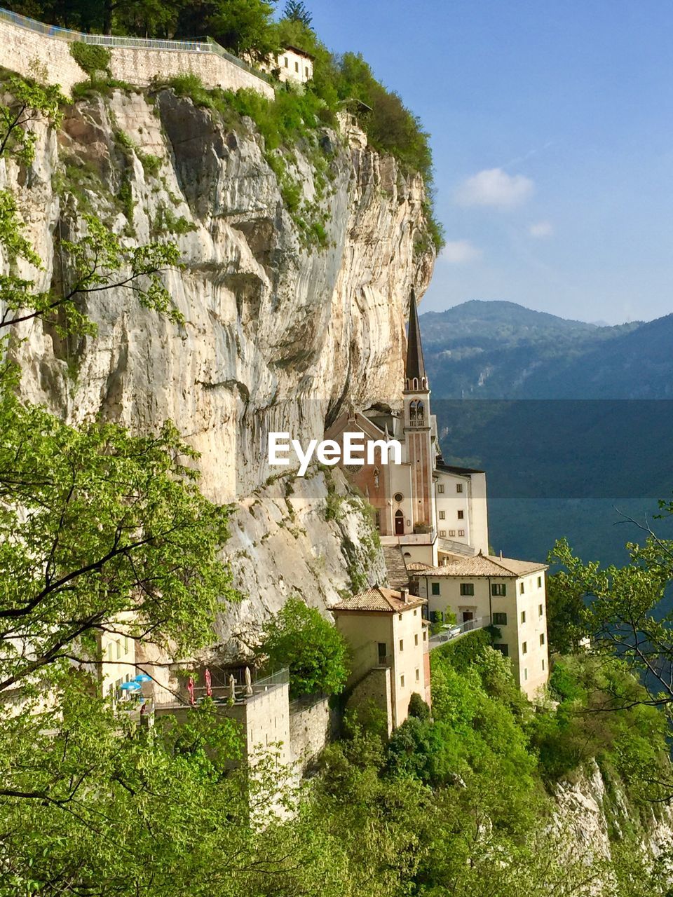 Low angle view of buildings against mountain