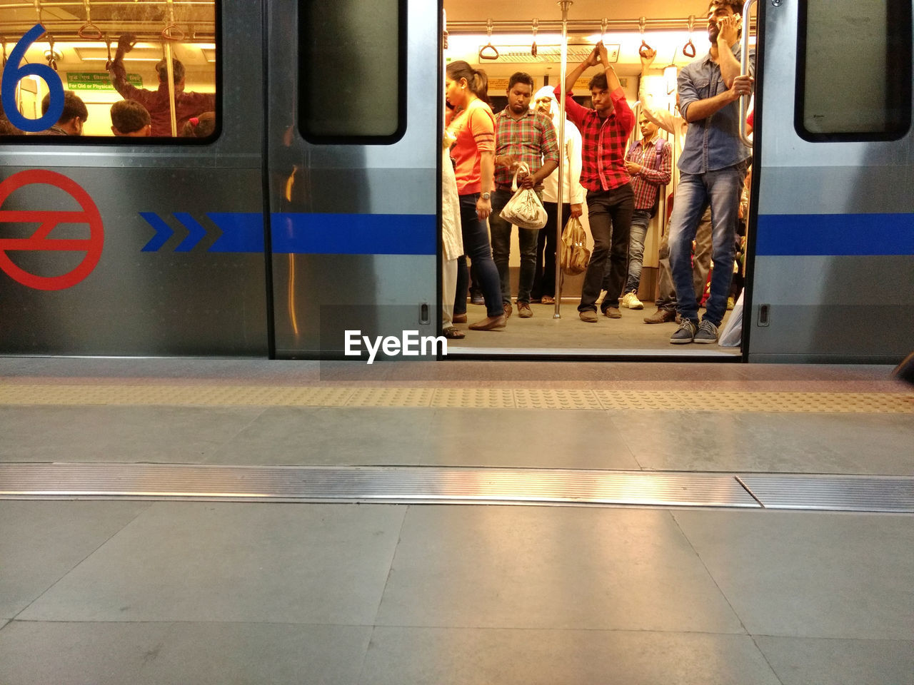 REFLECTION ON WINDOW OF TRAIN