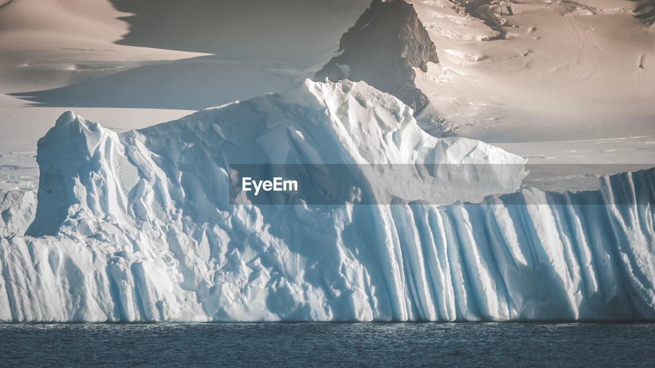 scenic view of snowcapped mountains against sky during winter