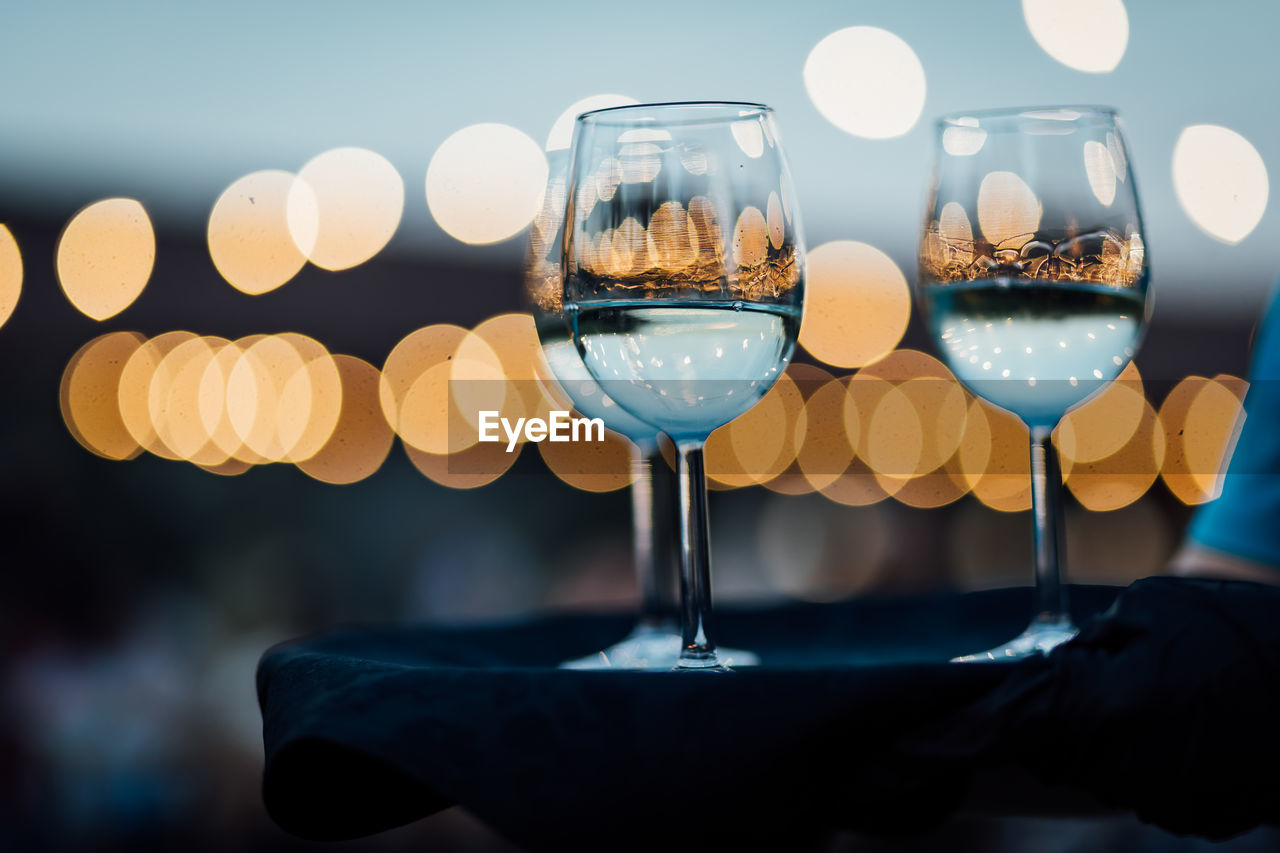 Luxury wine and champagne  for fine dining with and glassware, beautiful blurred  background. 