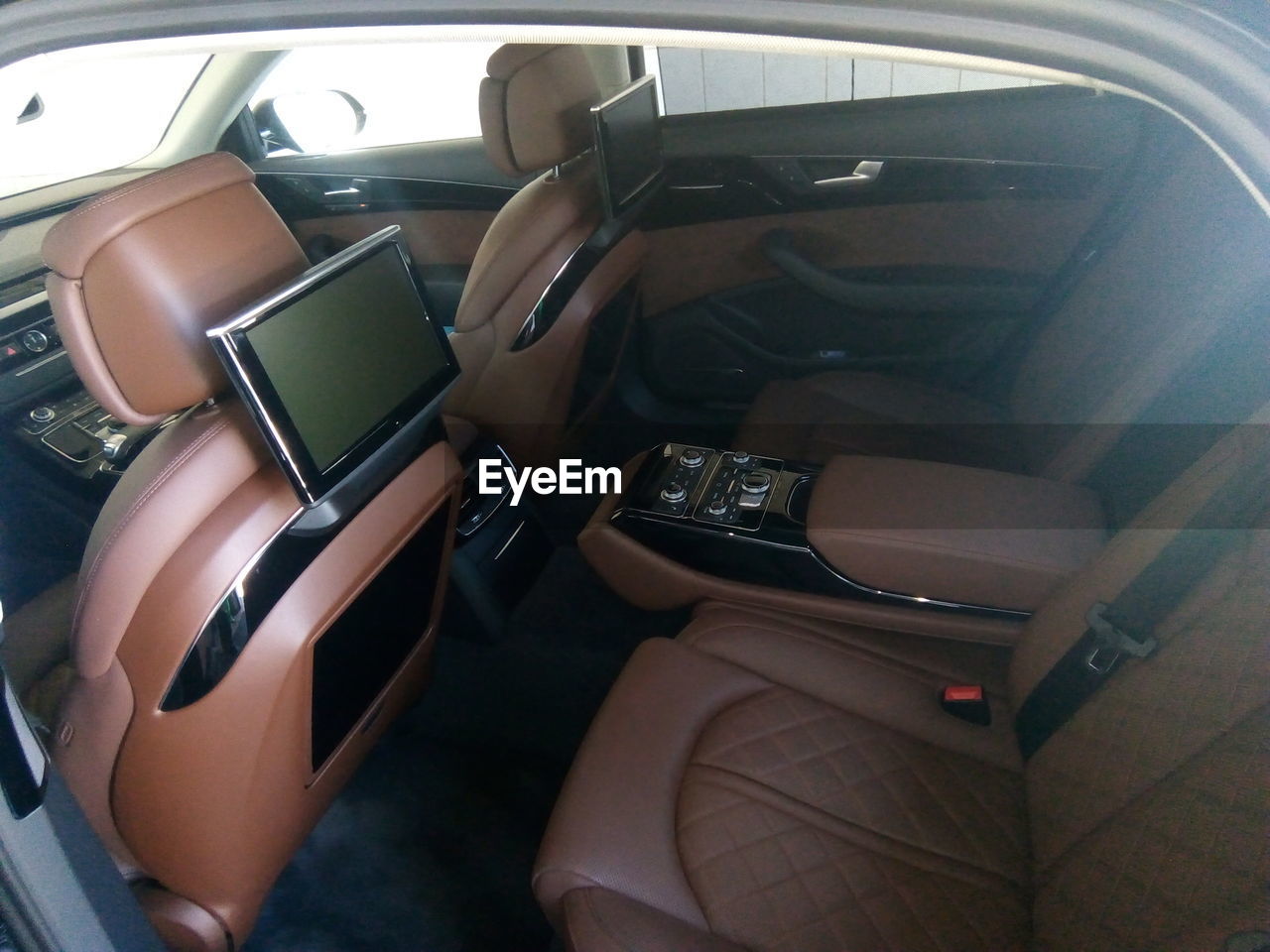 Interior of car seen through window