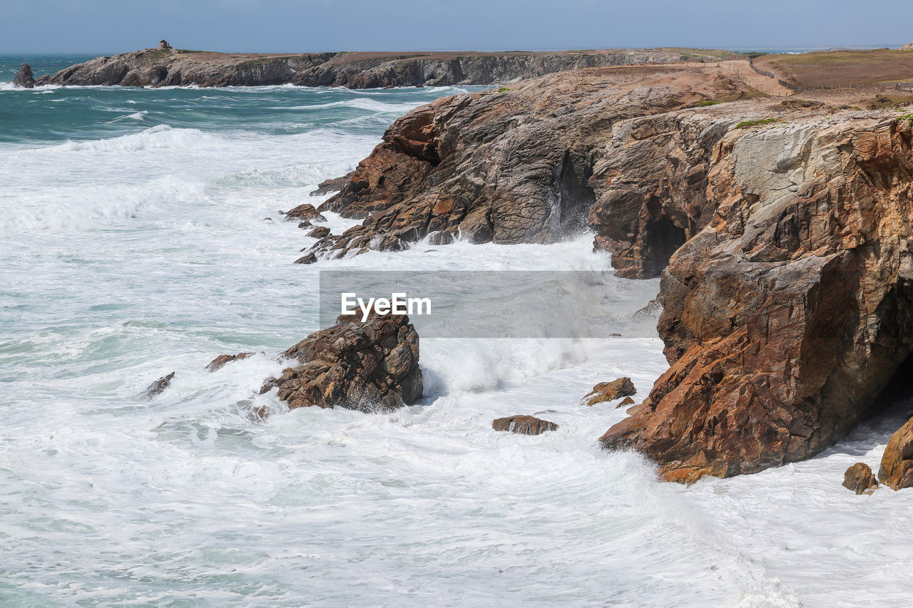 Spectacular natural cliffs on beautiful and famous coastline cote sauvage on peninsula quiberon