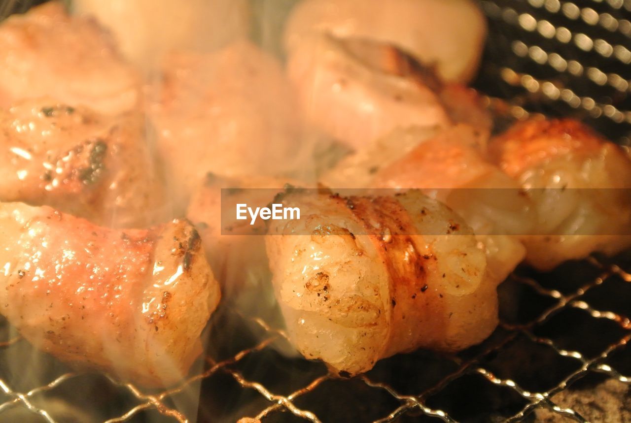 Close-up of meat on barbecue grill