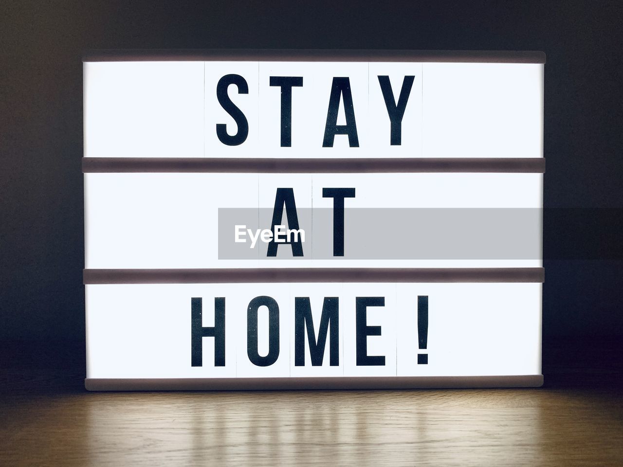 Light box with phrase to stay at home