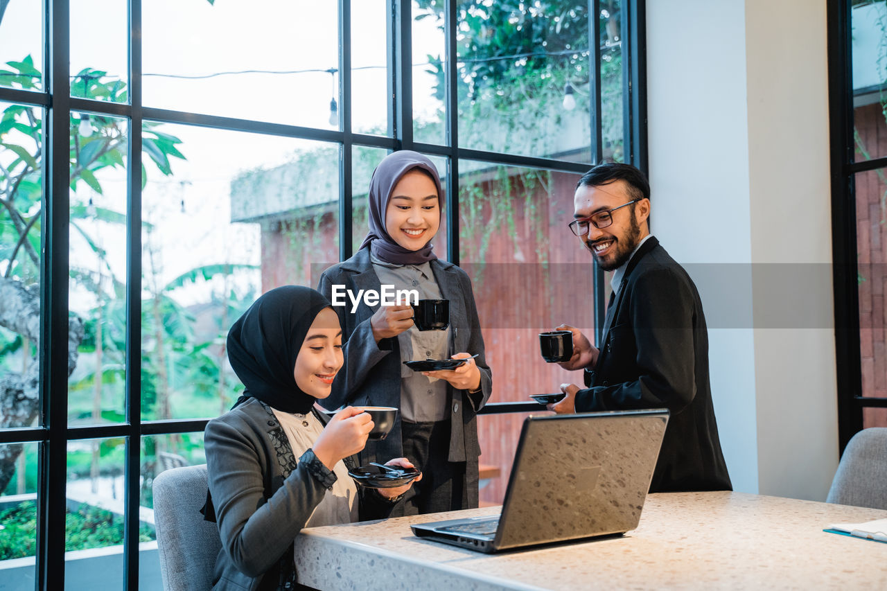 business colleagues working on table