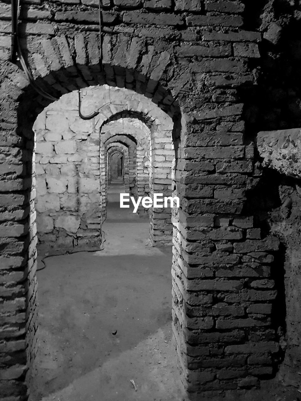 STONE WALL WITH CLOSED DOOR