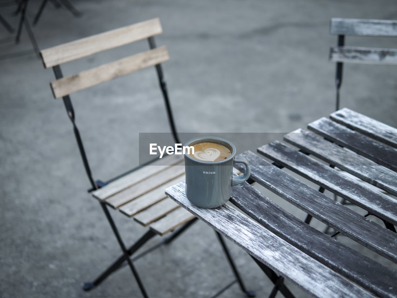 High angle view of cup on table at outdoor caf�