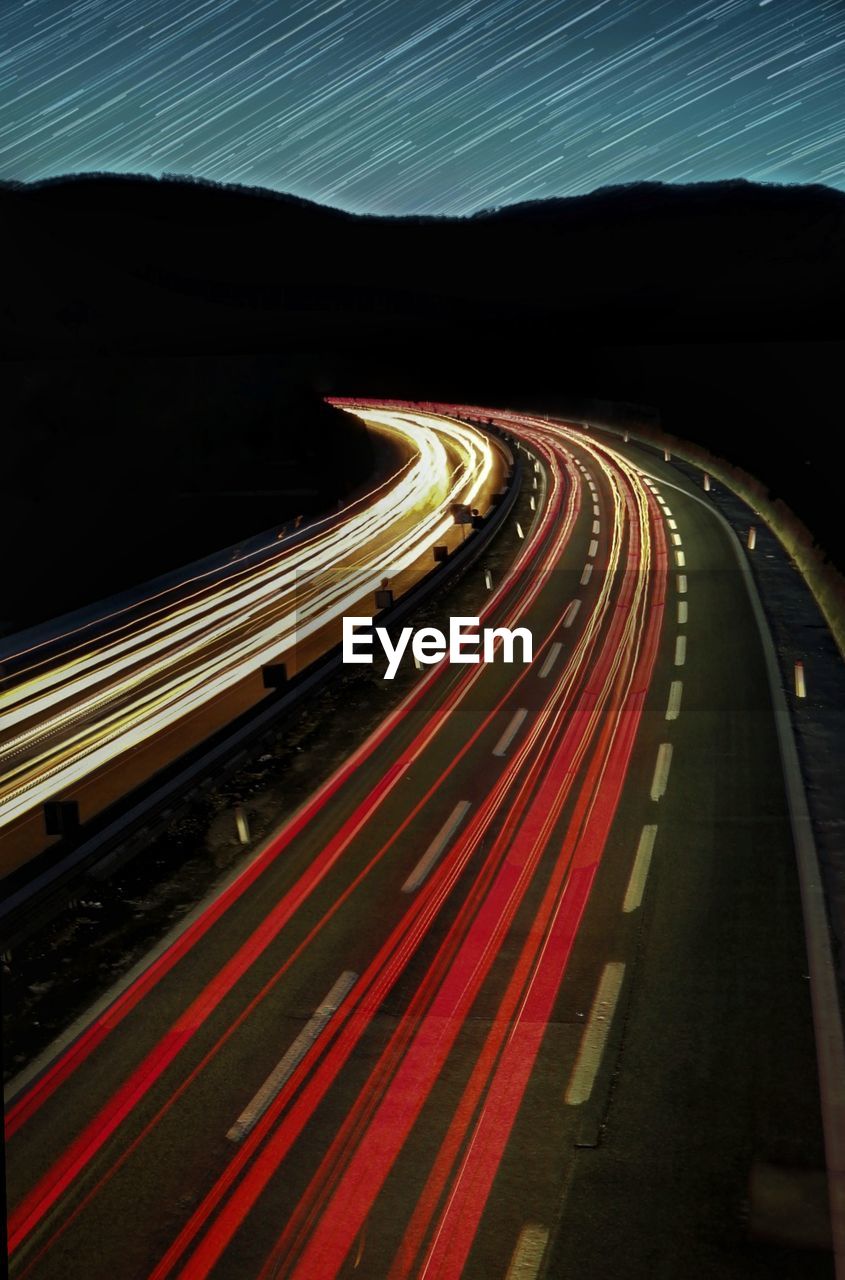 Light trails on road at night