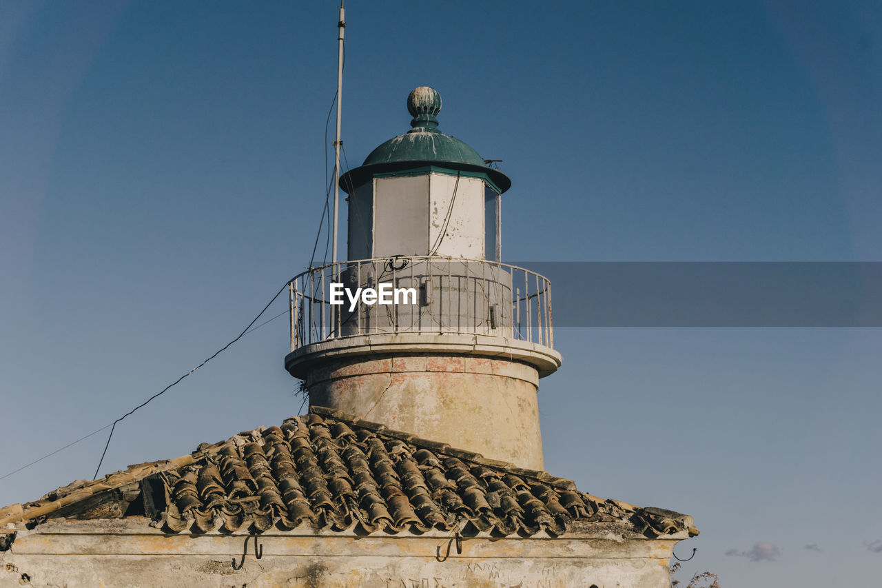 Low angle view of old building against sky. lighthouse in the old venetian fortress, kérkyra