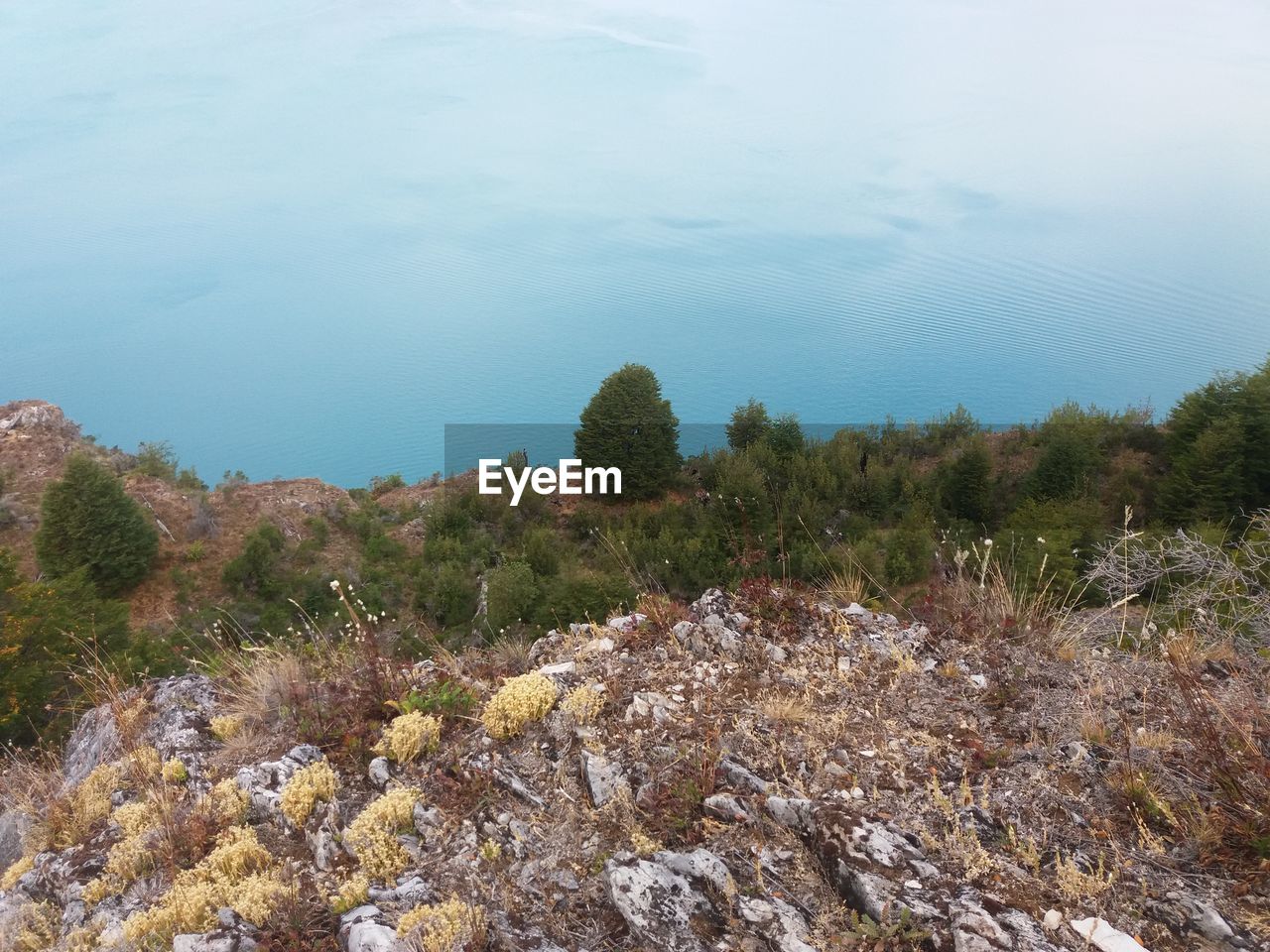 Scenic view of landscape against cloudy sky