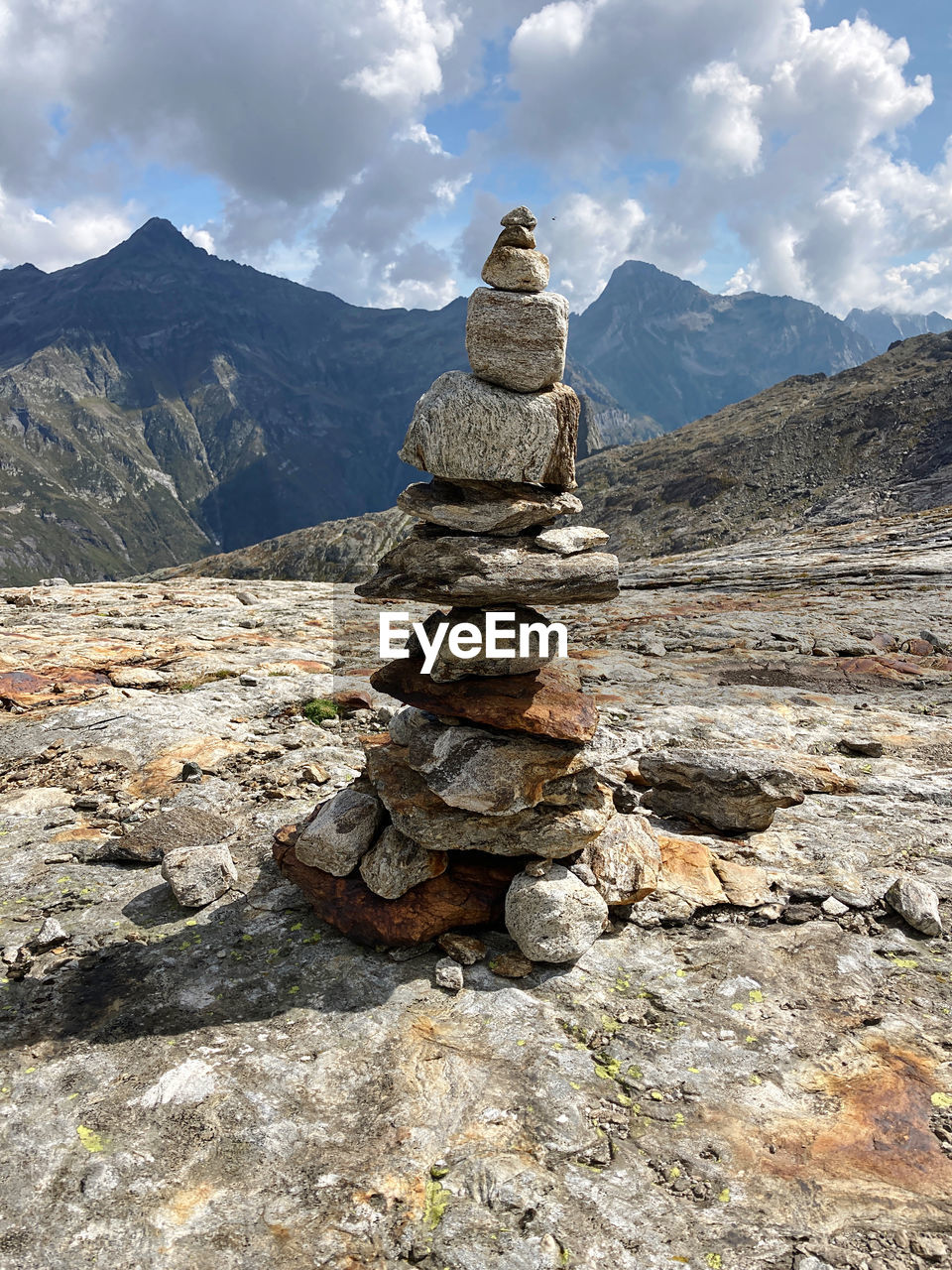 Stack of rocks on mountain against sky, rock cairns, find your way, ghiacciaio del basodino