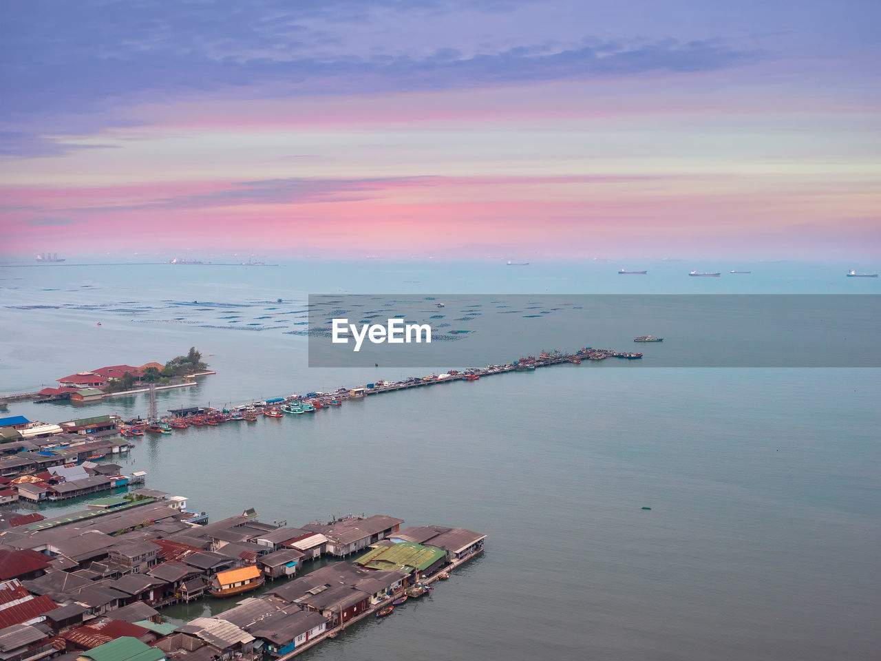 High angle view of sea against sky during sunset