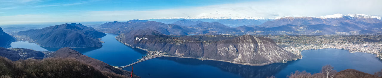 Wide angle view of lake lugano and the alps from the belvedere sighignola