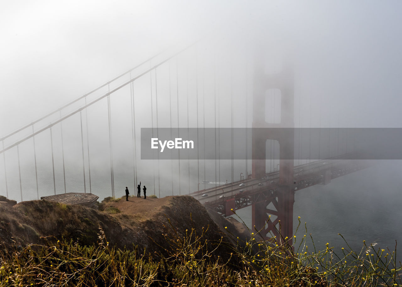 BRIDGE OVER FOGGY WEATHER