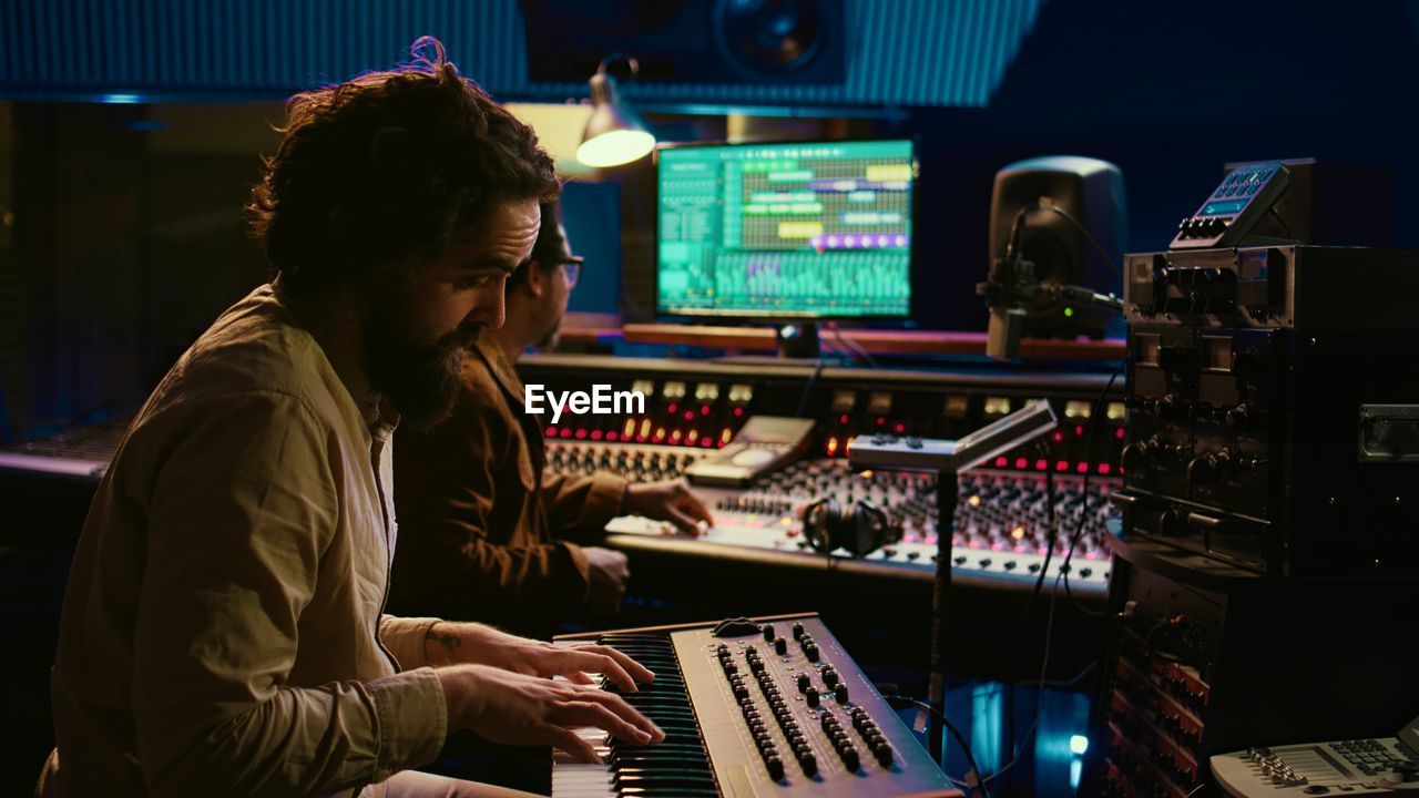 man using sound mixer