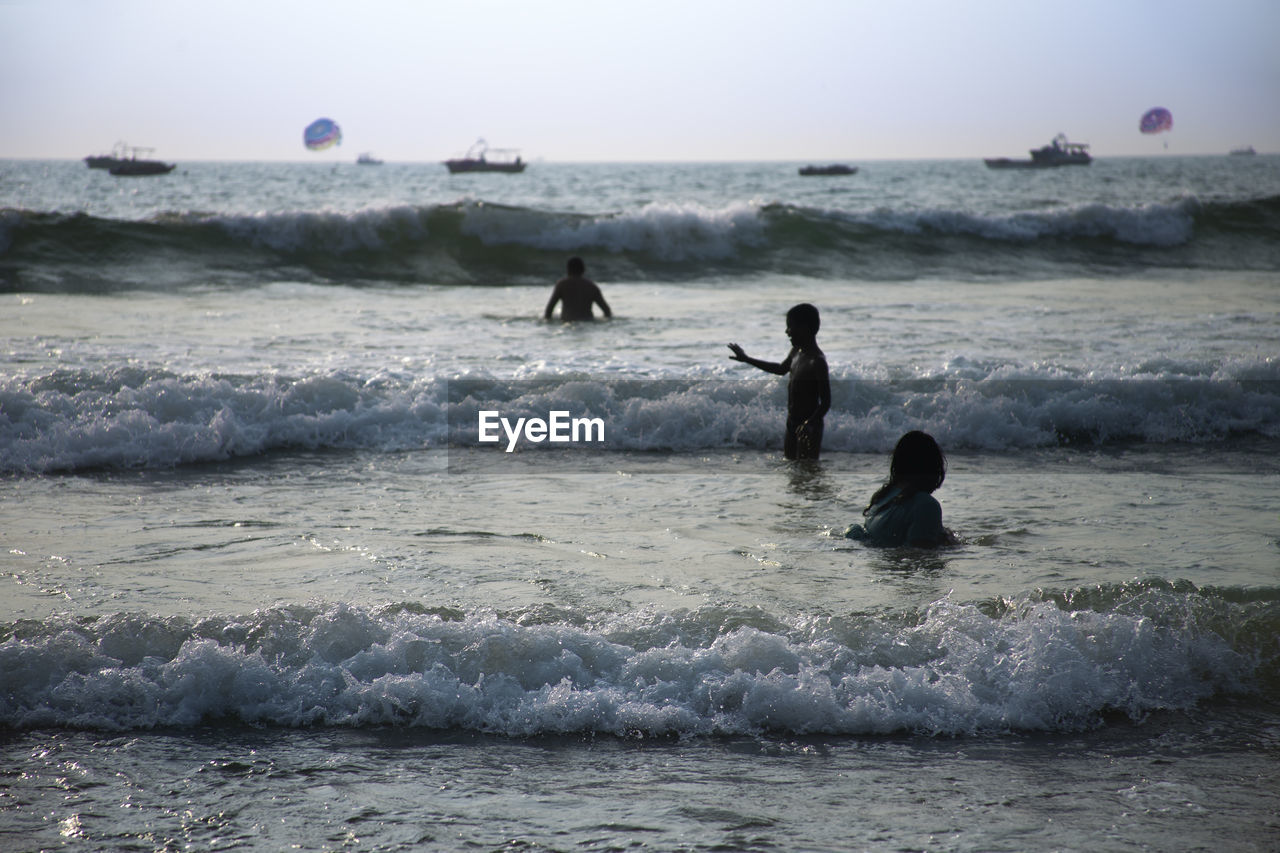 FULL LENGTH OF MAN ON BEACH