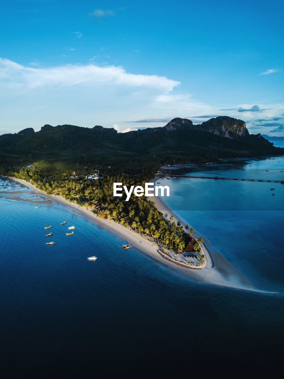 Scenic view of sea against blue sky