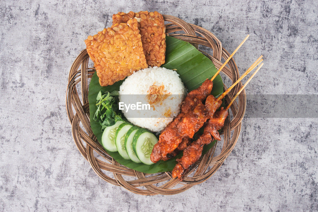 food, food and drink, healthy eating, freshness, wellbeing, vegetable, high angle view, dish, no people, basket, directly above, indoors, meal, meat, still life, cuisine, bread, fried, fruit, seafood, fish, egg, studio shot, produce, plate, root vegetable, asian food, table, container