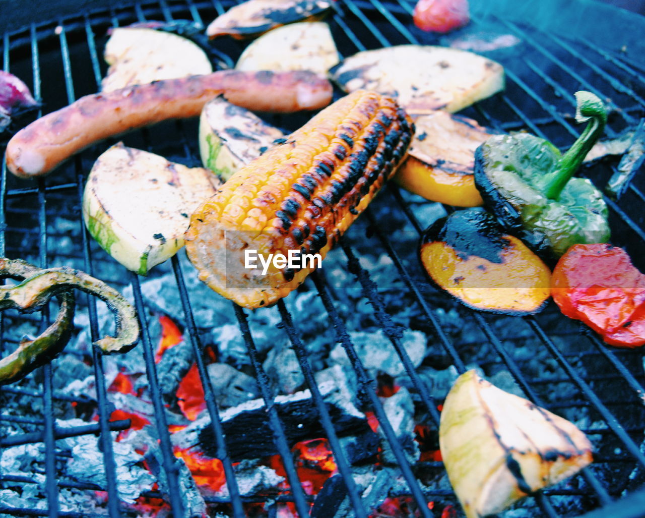 High angle view of various vegetables grilling on barbeque