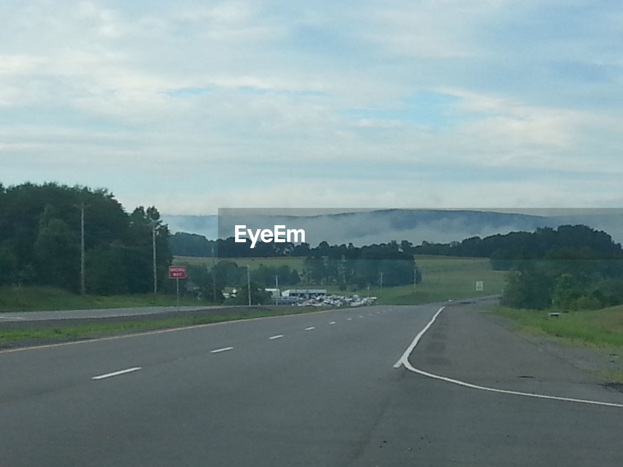 SCENIC VIEW OF EMPTY ROAD AGAINST SKY