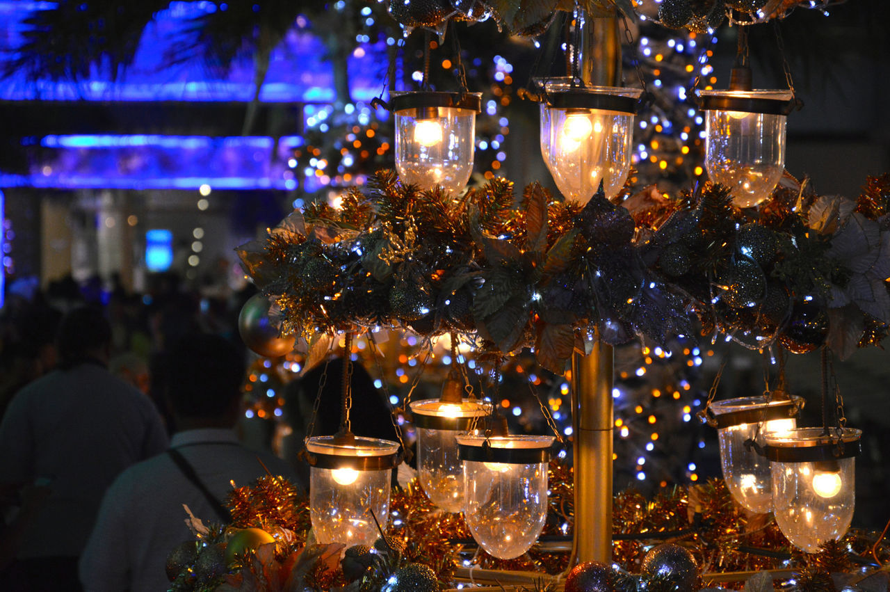 Close-up of christmas lights at night