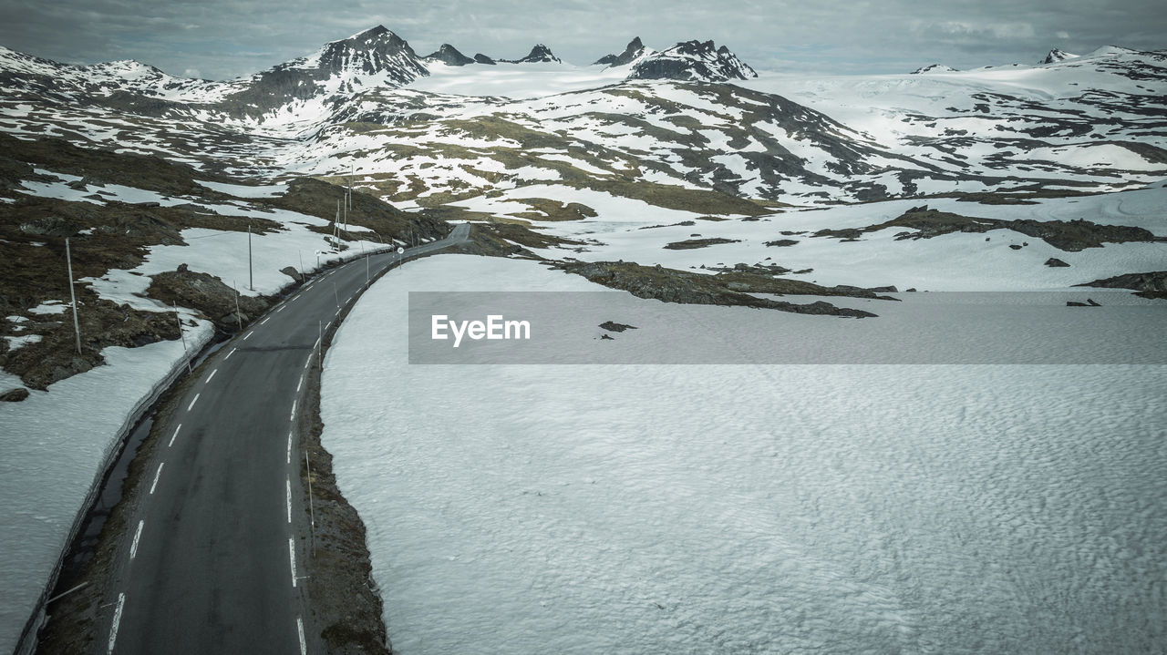 high angle view of snow covered road