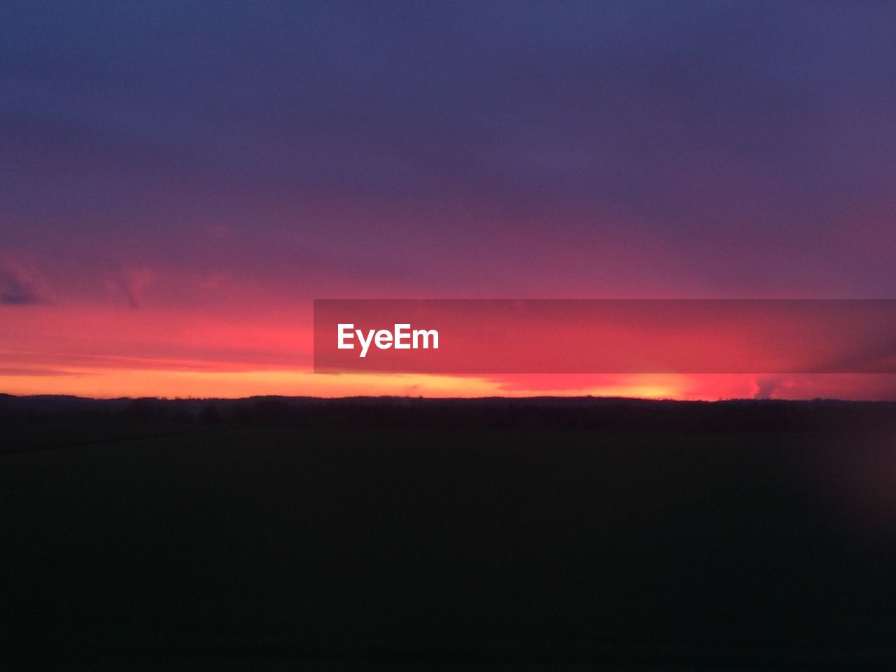 SILHOUETTE LANDSCAPE AGAINST SKY AT SUNSET