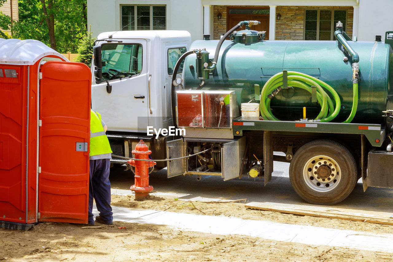 MAN WORKING ON TRUCK