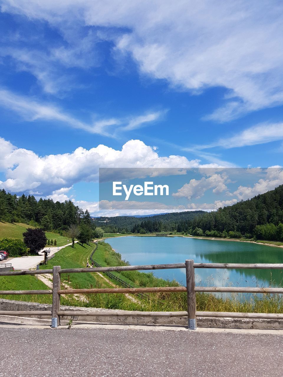 SCENIC VIEW OF LAKE AGAINST BLUE SKY