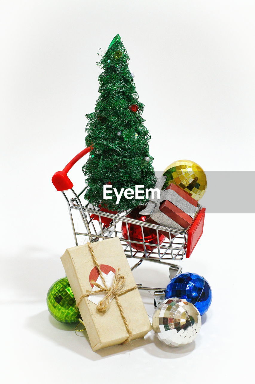 Christmas decorations against white background