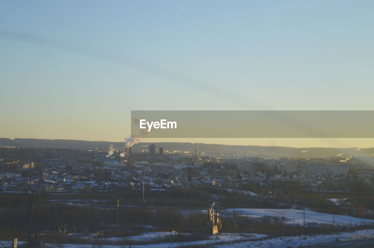 CITYSCAPE AGAINST SKY