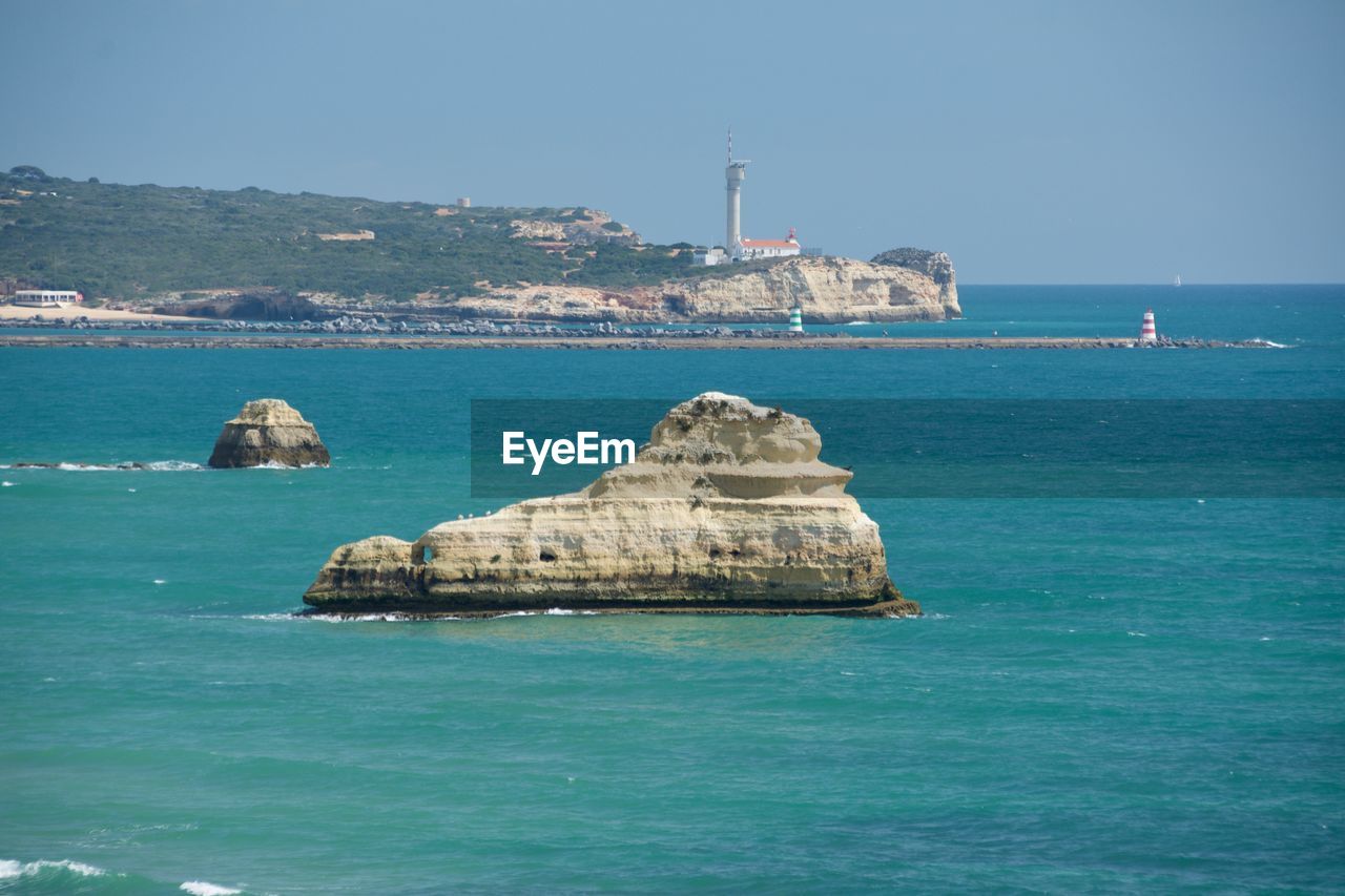 Scenic view of sea against clear sky