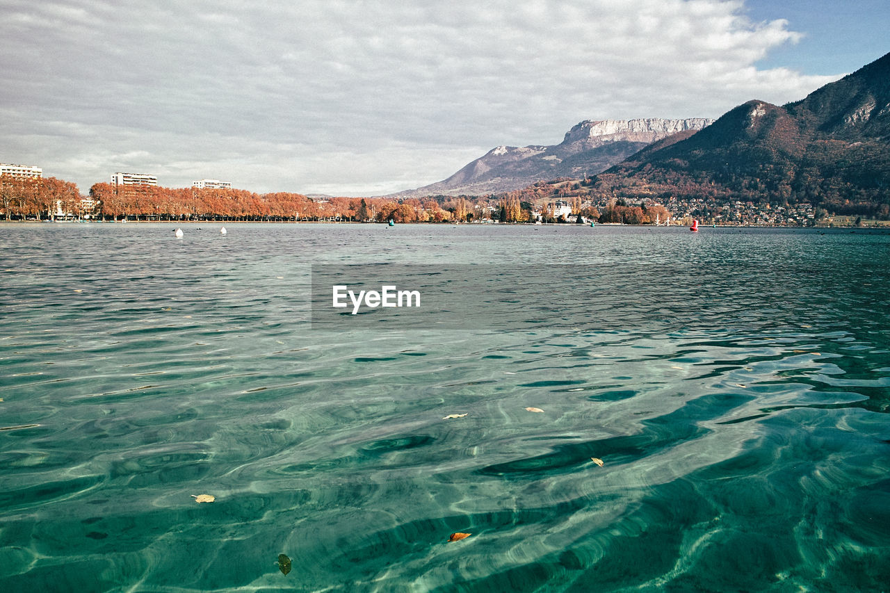 Scenic view of sea against cloudy sky