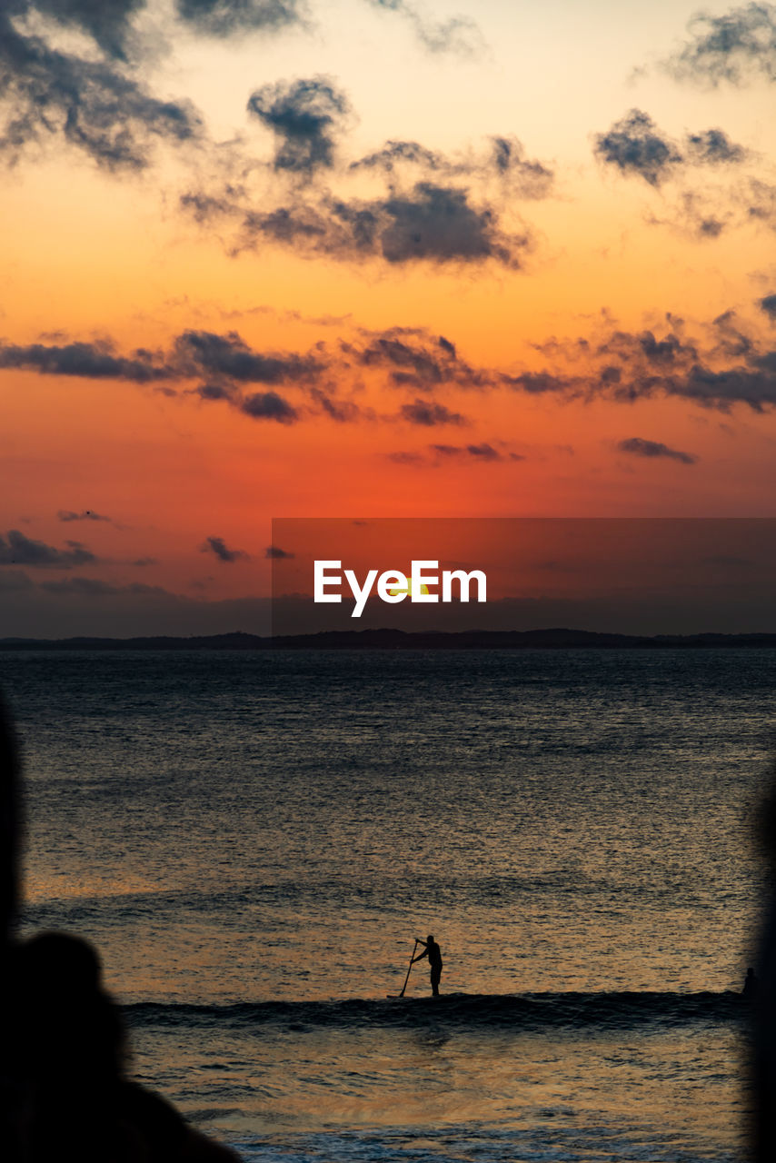 Dramatic sunset at farol da barra in salvador, bahia, brazil.