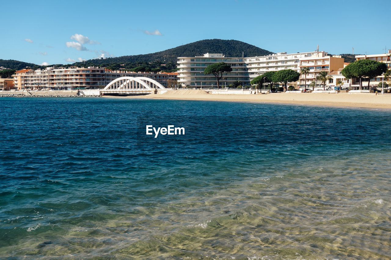 Scenic view of sea against clear blue sky